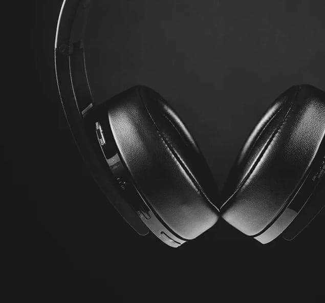 Workspace with headphones and phone
