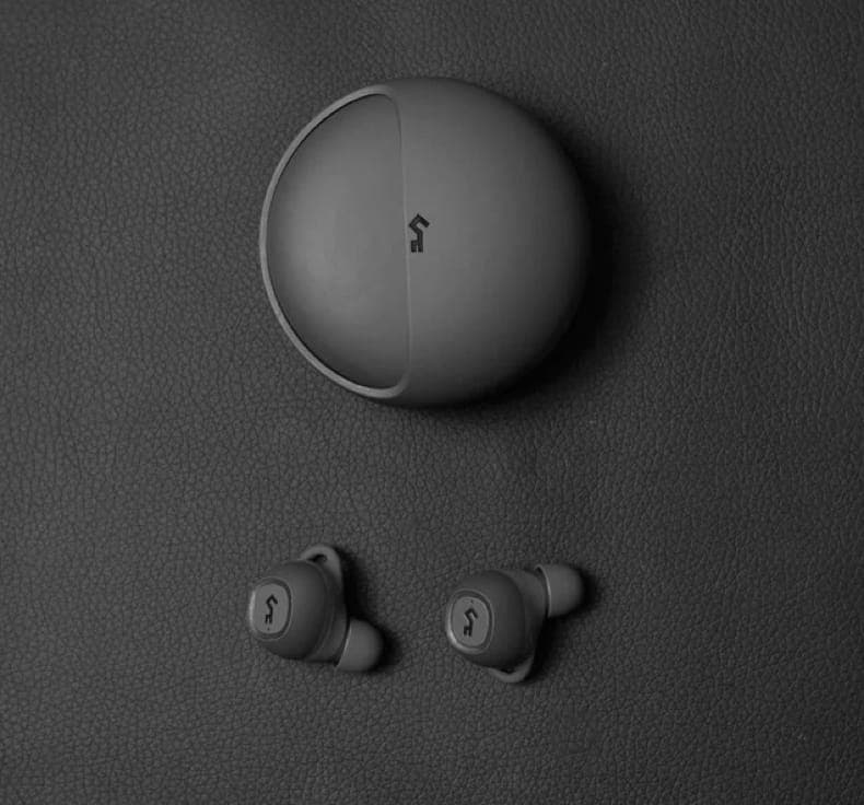 Workspace with headphones and phone